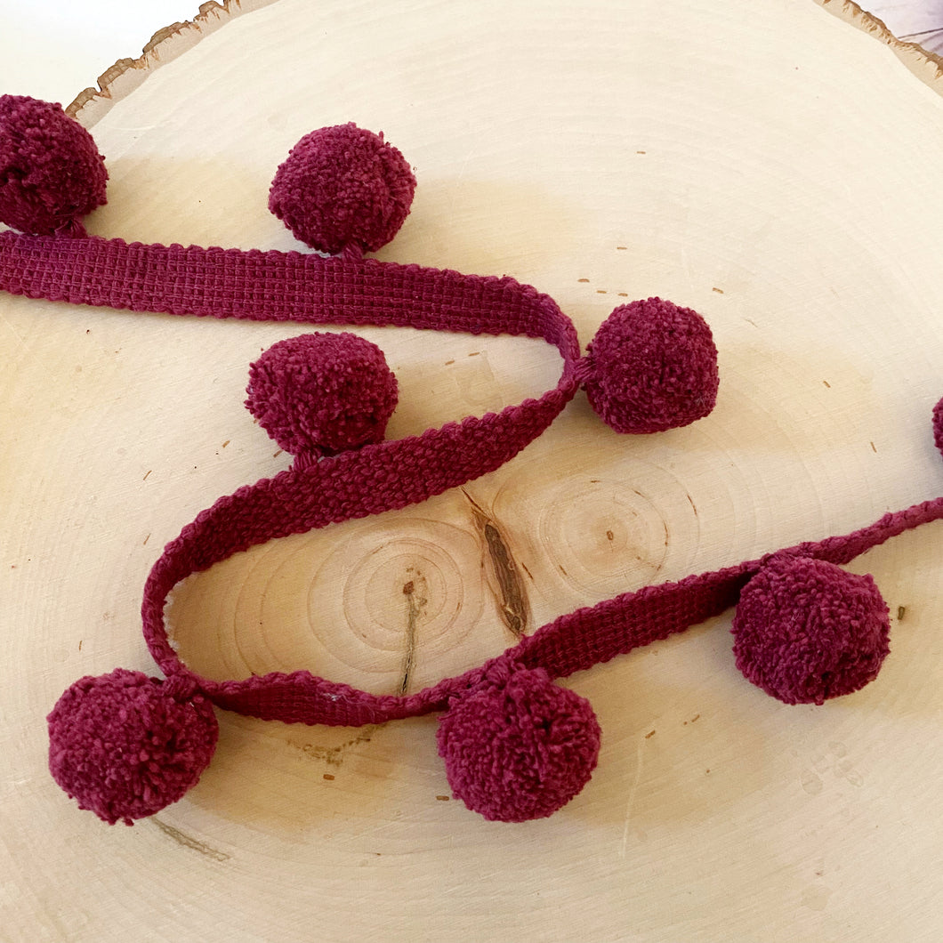 large burgundy red pom-poms add-on